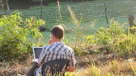 Working in the blue shirt at the Mindful Farm, Thailand