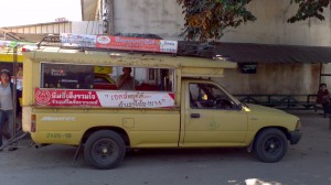 Thai style bus - a songthaew.  The kind of vehicle Ainlay jumped from in order to break her wrist.