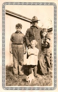 Dad with his father, sister Jean and brother Doug.  Dad's the fat one.