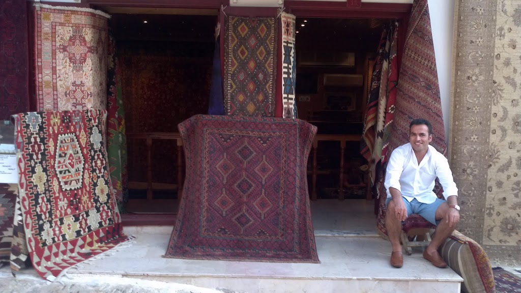 Rug seller in Kaş